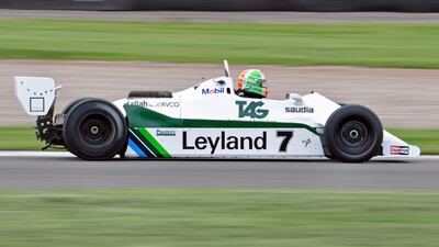 Racing driver Mike Williams puts a Williams Formula One car through its paces