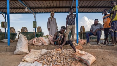 Workers at a small-scale gold milling operation in Sudan. Bloomberg