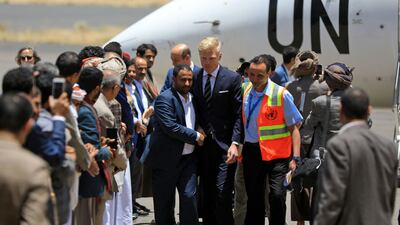 UN special envoy Hans Grundberg, centre, is received upon his arrival at Sanaa Airport in the Yemeni capital. AFP