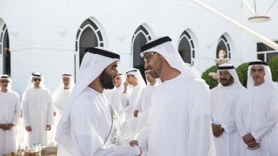 Sheikh Mohammed bin Zayed, Crown Prince of Abu Dhabi and Deputy Supreme Commander of the Armed Forces, greets Sheikh bin Bayyah (C), while receiving a delegation of participants of the Forum for Promoting Peace in Muslim Societies, during a Sea Palace barza. Ryan Carter / Crown Prince Court — Abu Dhabi