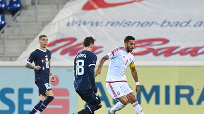 Ali Mabkhout controls the ball under pressure from Matias Galarza. Photo: UAE FA