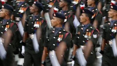 Sri Lankan Army soldiers march during a parade celebrating Sri Lanka's 65th Independence Day, marking the country's independence from British colonial rule in 1948 in Trincomalee, Sri Lanka, Monday, Feb. 4, 2013. (AP Photo/Eranga Jayawardena) *** Local Caption *** Sri Lanka Independence Day.JPEG-0253d.jpg
