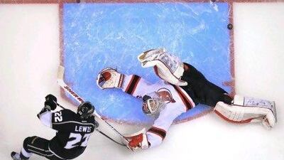 Goalie Martin Brodeur did everything but stand on his head to help the Devils win in Los Angeles and force a Game 5 back in New Jersey. But the Kings have been road warriors this post-season, winning 10 straight on the road.
