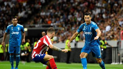 Ronaldo looks to get past Trippier. AP Photo