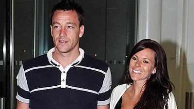 John Terry and wife Toni on their return from Dubai.