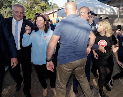 Australian Prime Minister Scott Morrison, left