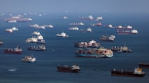 Container ships and bulk carriers off Singapore in February, 2024. Bloomberg