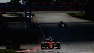 Vettel drives during the Malaysia Grand Prix at Sepang Circuit. Clive Mason / Getty Images