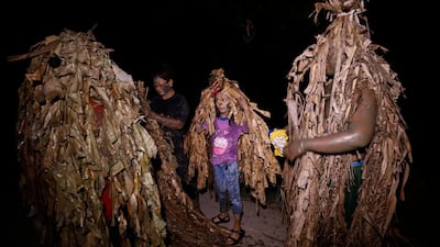 Devotees covered in mud and dried banana leaves take part in the Taong Putik ("mud people") Festival in the village of Bibiclat in Aliaga town, Nueva Ecija province, Philippines. Each year, the residents of Bibiclat village in Aliaga town celebrate the Feast of Saint John by covering themselves in mud, dried banana leaves, vines, and twigs as part of a little-known Catholic festival. Getty Images
