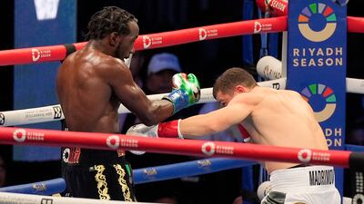 Terence Crawford, left, fights Israil Madrimov. AP