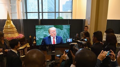 Members of the media inside the UN watch a television broadcasting US President Donald Trump's address General Debate of the General Assembly of the United Nations at United Nations Headquarters. EPA