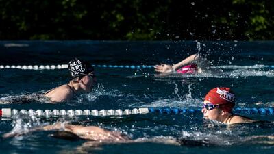 Swimmers exercise in an open air pool in Berlin, Germany. Authorities are easing lockdown measures across Germany. Getty Images
