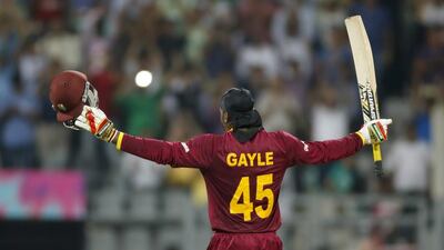 West Indies’ Chris Gayle celebrates his hundred runs against England during their ICC World Twenty20 2016 cricket match at the Wankhede stadium in Mumbai, India, Wednesday, March 16, 2016. (AP Photo/Rajanish Kakade)