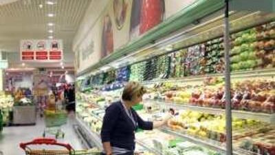 A shopper scrutinises the organic food on display at the Lulu supermarket in Al Wadha mall.