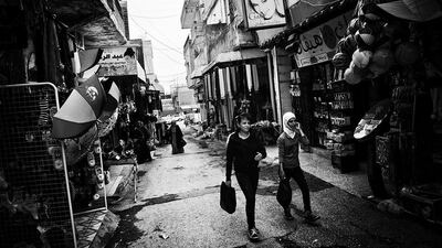 A view of the street market in Al Malikiyah. Christians, Kurds and Arabs seem to coexist peacefully but suspicion is always present among them. Years of repressive policies and favoritism by the government towards one group or another have left their mark.