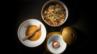 Chicken biryani, aubergine salsa and raita served in a globe at the Tresind Studio x Nadodi chef's table, on March 6 and 7