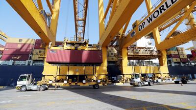 Port operator DP World's logo seen in Jebel Ali port. The company said it started work on a deep water port in Congo after reviewing terms in the contract. Reuters