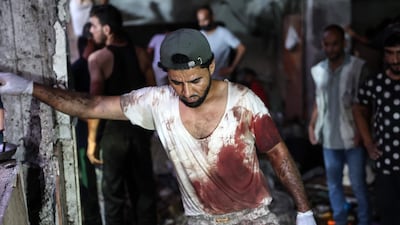 An Israeli air strike on Al Tabaeen school in Gaza city killed at least 100 people on Saturday. AFP