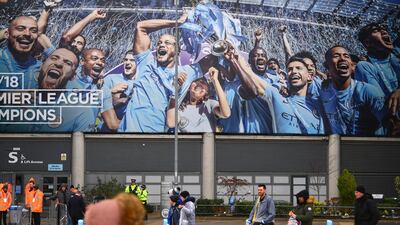 Fans walks outside the stadium prior to the Premier League match. Getty Images