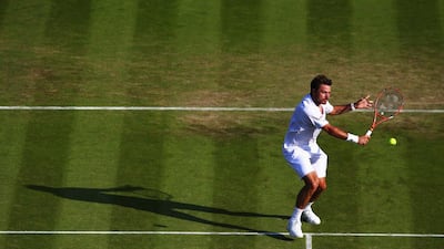 Stan Wawrinka in action during his Wimbledon second round victory over Victor Estrella Burgos. Ian Walton / Getty Images / July 1, 2015
