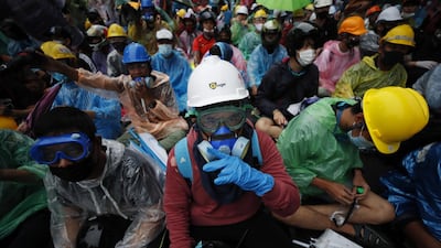 Pro-democracy protesters gather at the Victory Monument during an anti-government protest in Bangkok, Thailand on October 18, 2020. People have gathered for a fifth straight day of demonstrations, defying a government emergency decree banning the gathering of four or more people. EPA