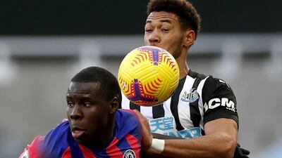 Joelinton, right, of Newcastle vies for the ball with Kurt Zouma of Chelsea. EPA