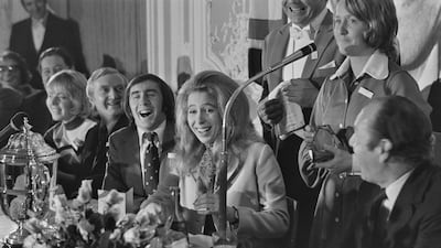 British Formula One racing driver Jackie Stewart alongside Princess Anne at the 1972 'Daily Express Sportsman & Sportswoman of the Year' luncheon in London.