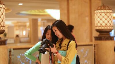 A visa-on-arrival scheme for Chinese visitors has catapulted China to the third place among Abu Dhabi’s tourism markets. Fatima Al Marzooqi / The National