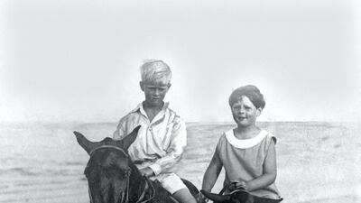 King Michael of Romania, right, rides with his cousin Prince Philip of Greece on the sands at Constanza, August 1928. Reuters