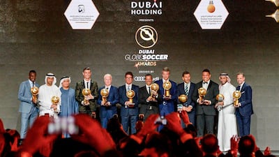 Juventus FC midfielder, Blaise Matuidi (L) and (From 3rd L) vice-chairman of the Dubai Sports Council Mattar Al Tayer, Juventus' Portuguese forward Cristiano Ronaldo, head coach of the French national football team, Didier Deschamps, Italian former professional football manager, Fabio Capello, Portuguese football agent Jorge Mendes, CEO of Atletico Madrid, Miguel Angel Gil Marin, former Croatian footballer and current Deputy Secretary General of FIFA, Zvonimir Boban, Brazilian retired footballer, Ronaldo Luis Nazario de Lima aka Ronaldo, retired Saudi Arabian footballer, Sami Al-Jaber and Juventus FC Sporting Director, Fabio Paratici pose for a group photo with their respective award during the 10th edition of the Dubai Globe Soccer Awards in Dubai. AFP