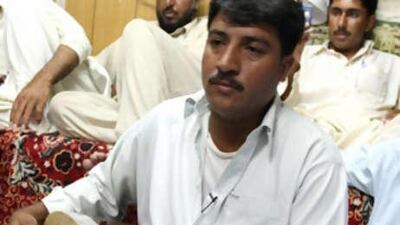 Rasha Khan performs at a labour camp in Musaffah. The rubab is considered "the Lion of Instruments".