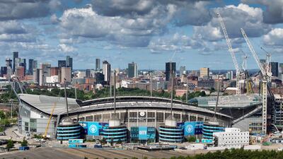 Etihad Stadium, home of Manchester City FC, with the Ancoats and Islington neighbourhoods in the background, all in the recently developed East Manchester. Getty Images