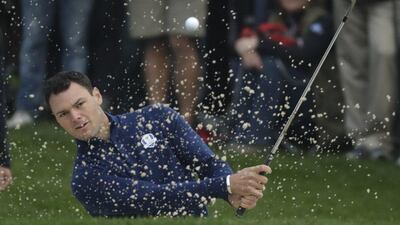 Europe’s Martin Kaymer hits from a bunker on the first hole during morning foursomes at the Ryder Cup. Chris Carlson / AP Photo