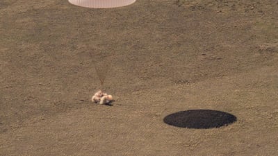 The Soyuz MS-17 spacecraft lands near the town of Zhezkazgan, Kazakhstan, with three crew members after completing their six-month mission on the International Space Station. AFP