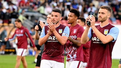 Aston Villa players thank the fans after the match. Getty