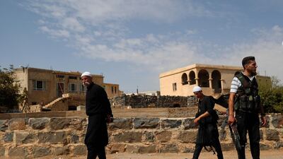Young Druze armed men, who carry weapons to defend their village from Islamic State attack, patrol the village of Rami in the southern province of Sweida, Syria. AP