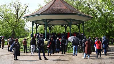 People take part in a vigil for Sasha Johnson, a BLM activist, who was shot in an early morning attack near her home in Peckham, in Ruskin Park, London, Britain. Reuters
