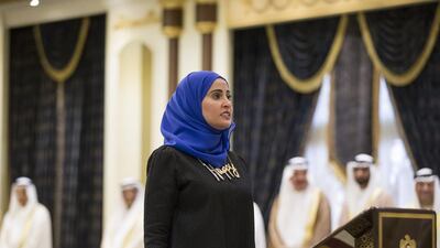 HE Ohood Al Roumi, UAE Minister of State for Happiness, gives an oath during a swearing-in ceremony for ministers of the United Arab Emirates. Ryan Carter / Crown Prince Court - Abu Dhabi