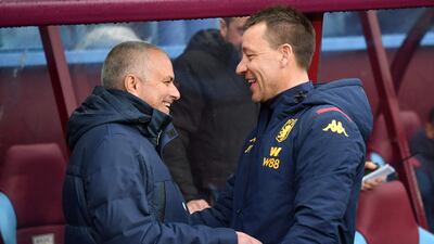 Aston Villa assistant manager John Terry, right, with Jose Mourinho - his old manager at Chelsea - before the game at Villa Park. AFP