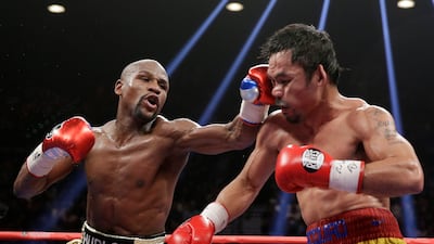 Floyd Mayweather Jr, left, will fight a rematch against Manny Pacquiao on Netflix in September. AP