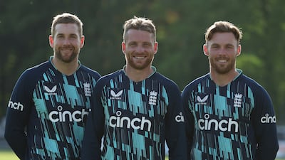 England's centurions Dawid Malan, Jos Buttler and Phil Salt pose for a picture after the first ODI against Netherlands. Getty Images
