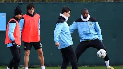 Samir Nasri, second right, and his Manchester City teammates train at Carrington yesterday ahead of their clash with Bayern Munich.