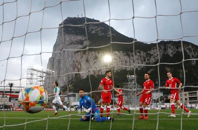 Jeff Hendrick, left, runs off in celebration after scoring the only goal of the game in Ireland's win over Gibraltar. Reuters