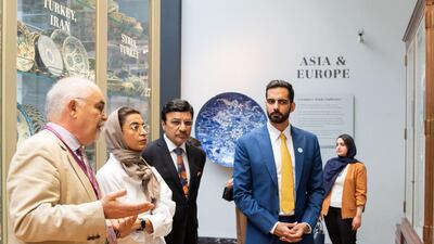 Noura Al Kaabi at the Ceramic Galleries, with Tim Stanley. Accompanying her are Sulaiman Hamid Almazroui (centre), Ambassador of the UAE to the United Kingdom; and Salem Al Qassimi (right) from Ministry of Culture and Knowledge Development UAE. Eleanor Bentall for The National