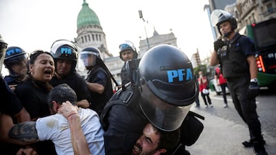 A man is detained during a demonstration against Argentina's President Javier Milei adjustment policies, in Buenos Aires, Argentina. Reuters