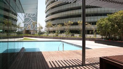 Al Raha Beach apartments: Q1 3% rise. 1BR - Dh90-120,000. 2BR - Dh135-170,000. 3BR - Dh170-220,000. Q1 2013-Q1 2014 15% rise. Fatima Al Marzooqi / The National.