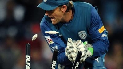 Adam Gilchrist behind the stumps for Deccan Chargers.