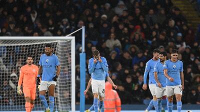 City players look dejected after Rafa Mir's goal. Getty