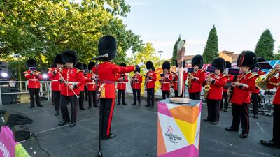 The Queen's Baton is greeted by a band as it reaches Solihull in Birmingham. Getty Images