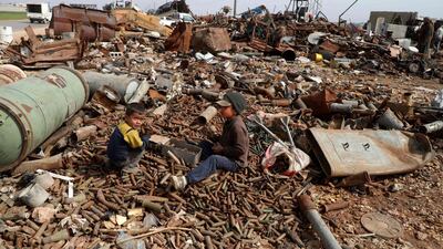 According to the UN, approximately 2.4 million children are out of school in Syria, with many helping their families sell scrap to eke out a living. AFP